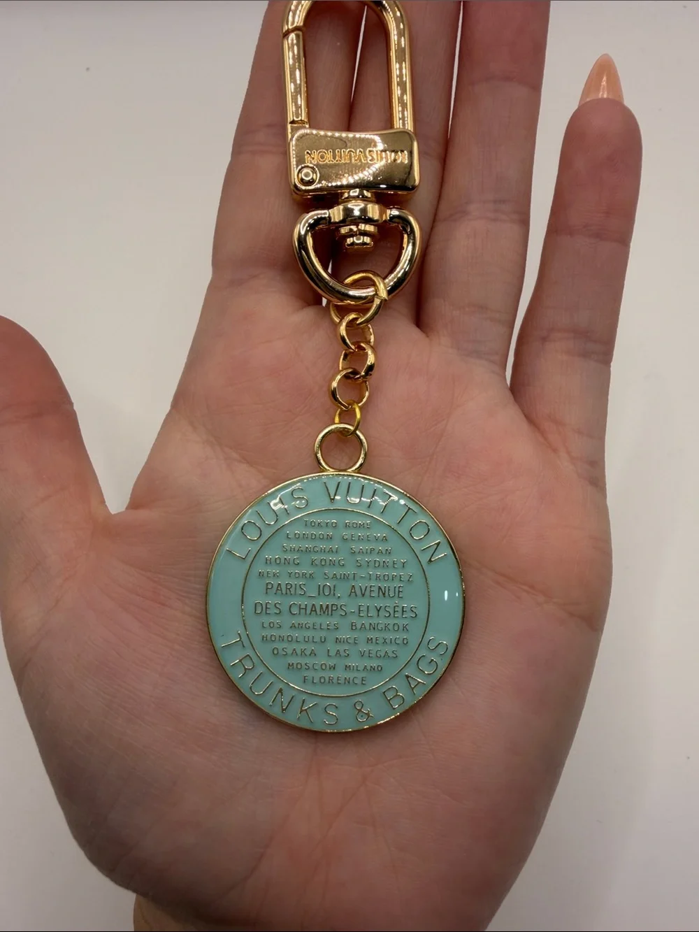 1489. Gold and Teal Round Keychain Charm